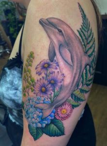 Dolphin Tattoos - Ideas, Meanings & Designs - Tattoo Me Now